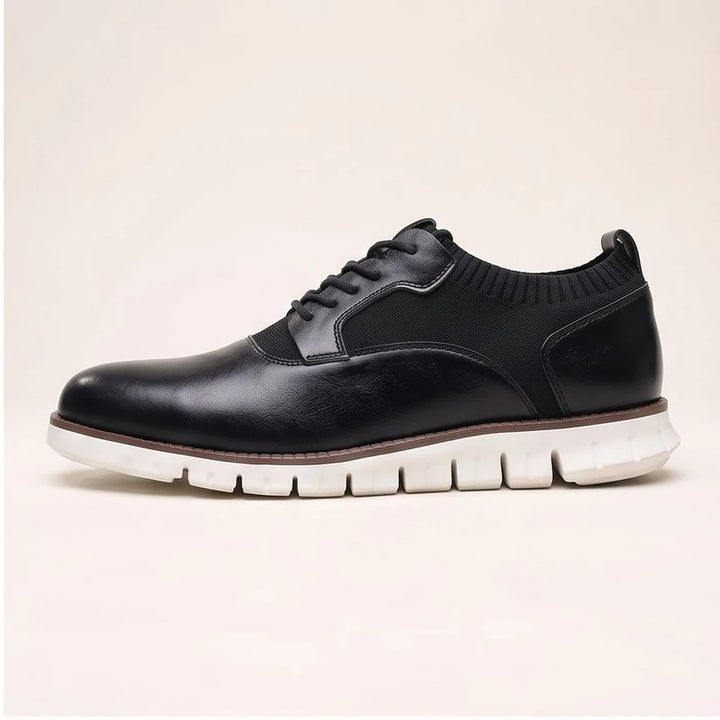 Black woven shoes in a studio background - 2