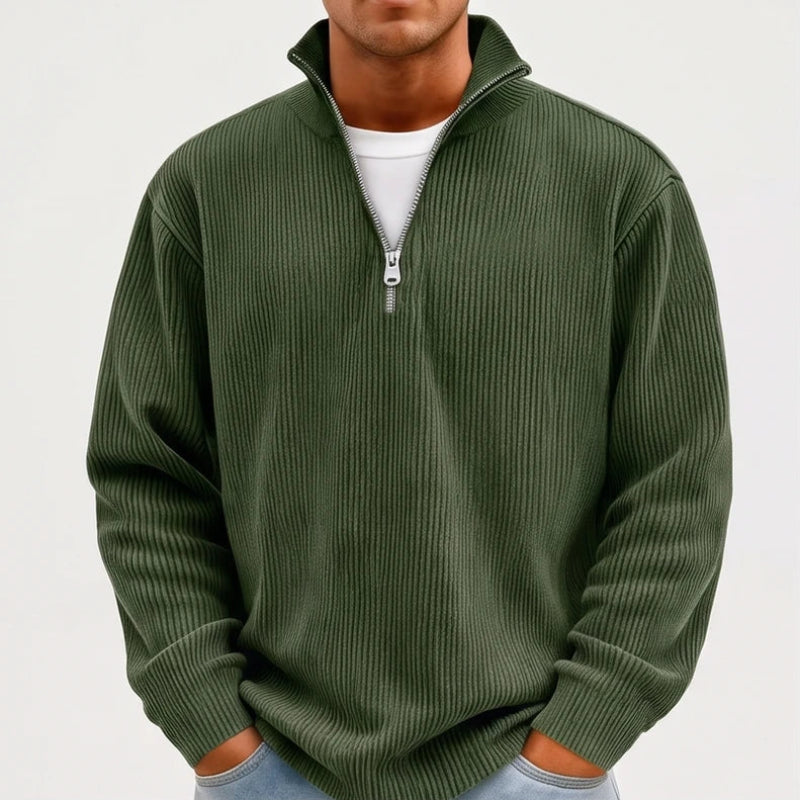 Model wearing Dark Green corduroy pullover in a studio