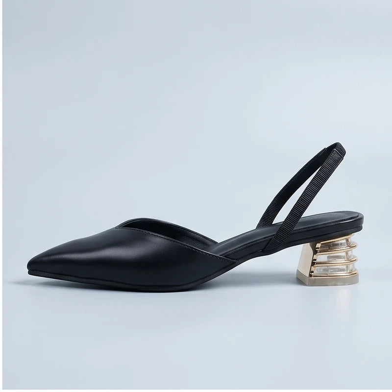 Black sandals in a studio background - 2
