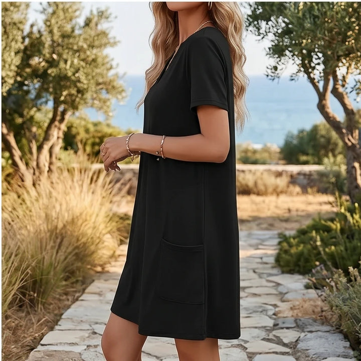 Model wearing A Women's Dress New Summer Casual V-Neck Wedding Loose Dress Short Sleeve Fashion Beach Vacation Wear dress outdoors - 3