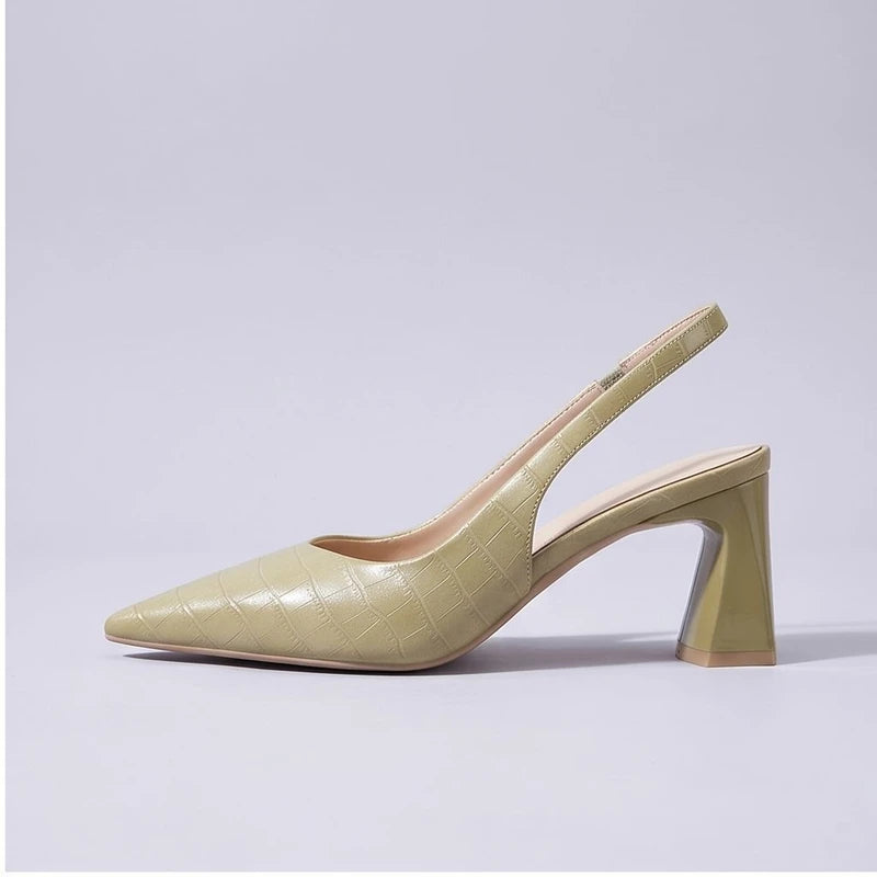 Yellow heel in a studio background - 2
