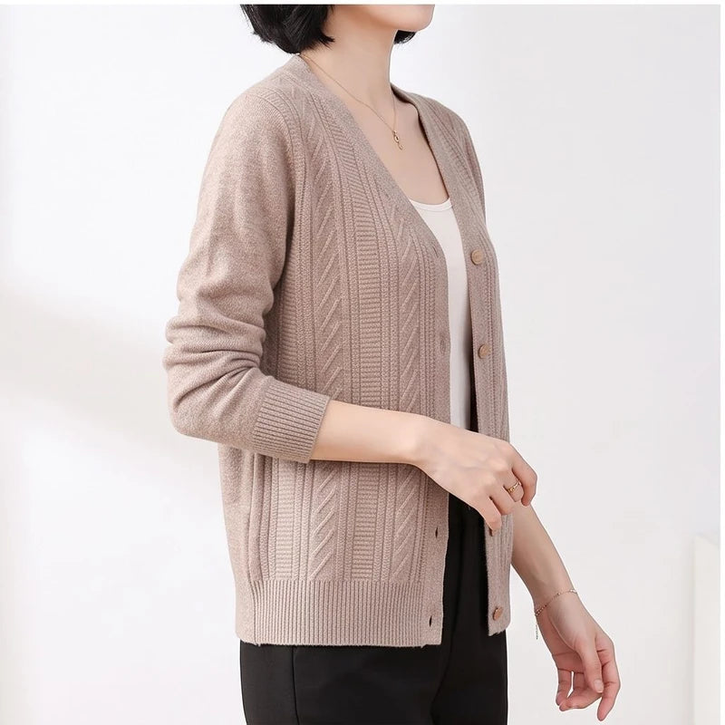 Model wearing Camel knitted cardigan in a studio - 2
