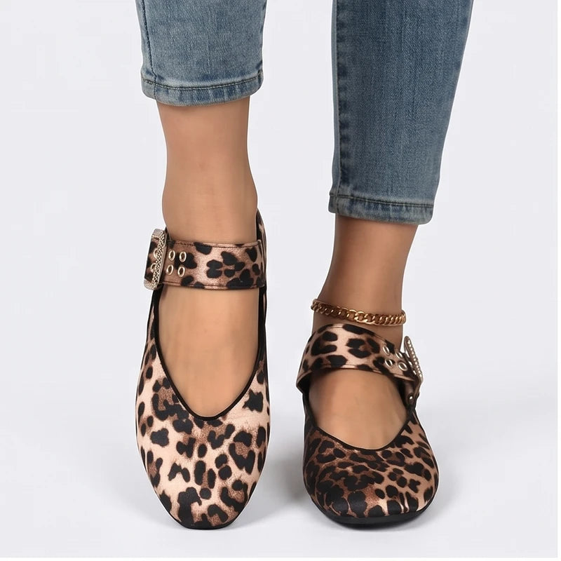 Model wearing Leopard Larkin Buckle Mary Jane Flats in studio