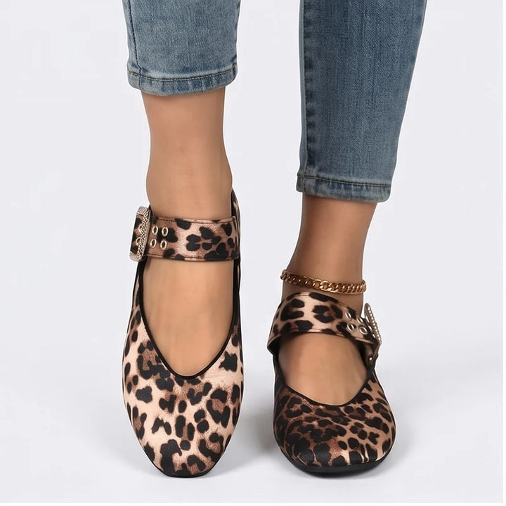 Model wearing Leopard Larkin Buckle Mary Jane Flats in studio