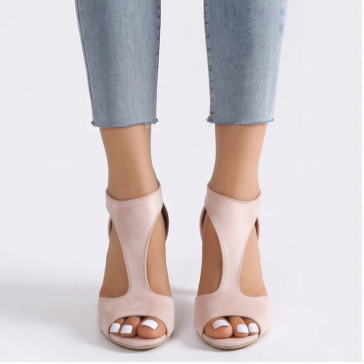 Model wearing Beige sandals in a studio