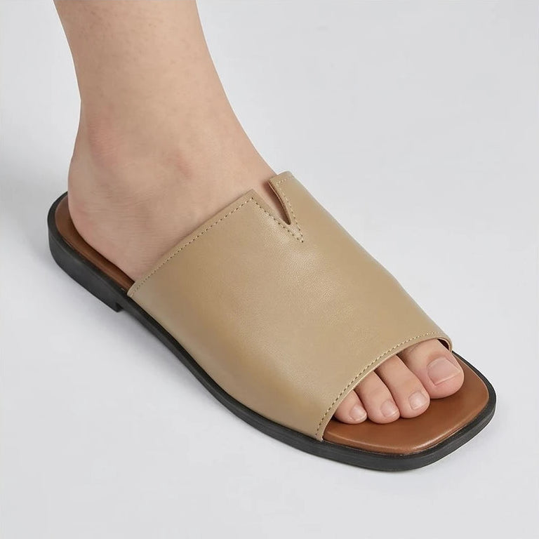 Model wearing Khaki Shiny Metallic Flat Slides for Women Square Toe Open Toe Lightweight Comfortable Summer Beach Casual Daily Walking Shoes in studio - 3
