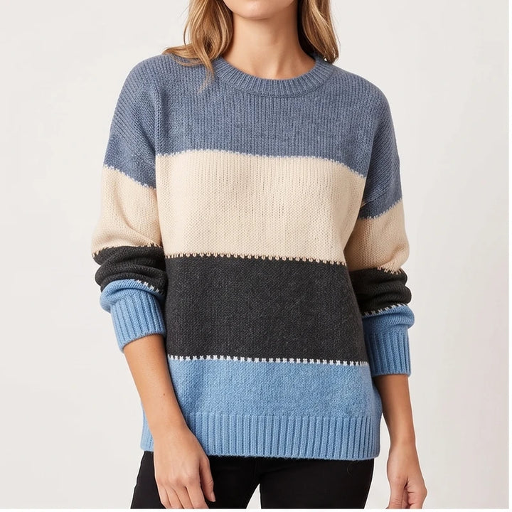 Model wearing Blue pullover in a studio
