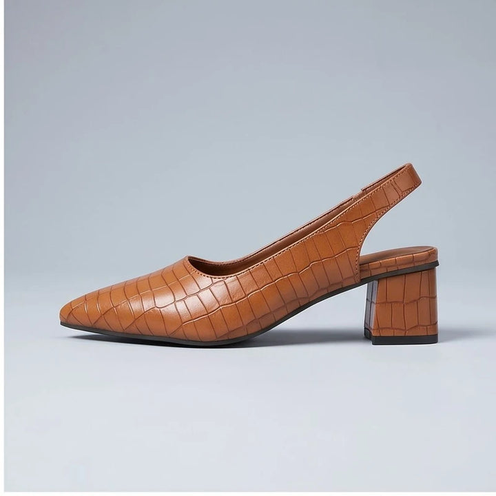 Brown heels in a studio background - 2