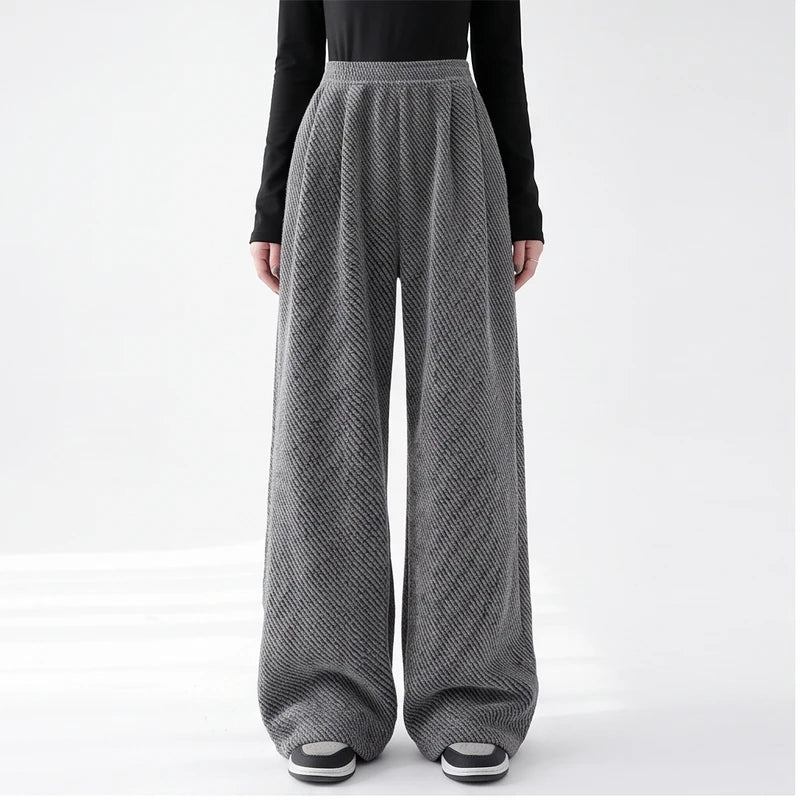 Model wearing Dark Gray knit apparel in a studio