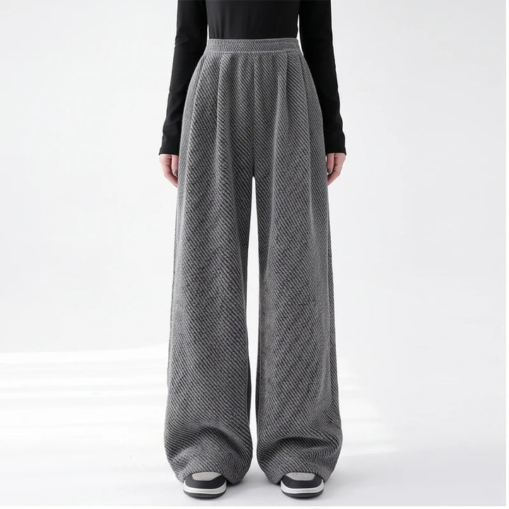 Model wearing Dark Gray knit apparel in a studio