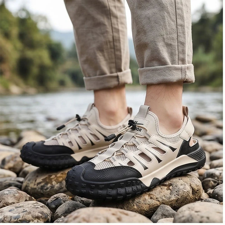 Model wearing Beige Colby Mesh Amphibious Sandals outdoors
