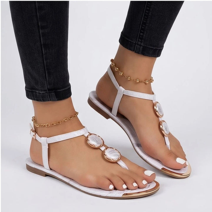Model wearing White Harlow T-Strap Flat Sandals in studio - 3