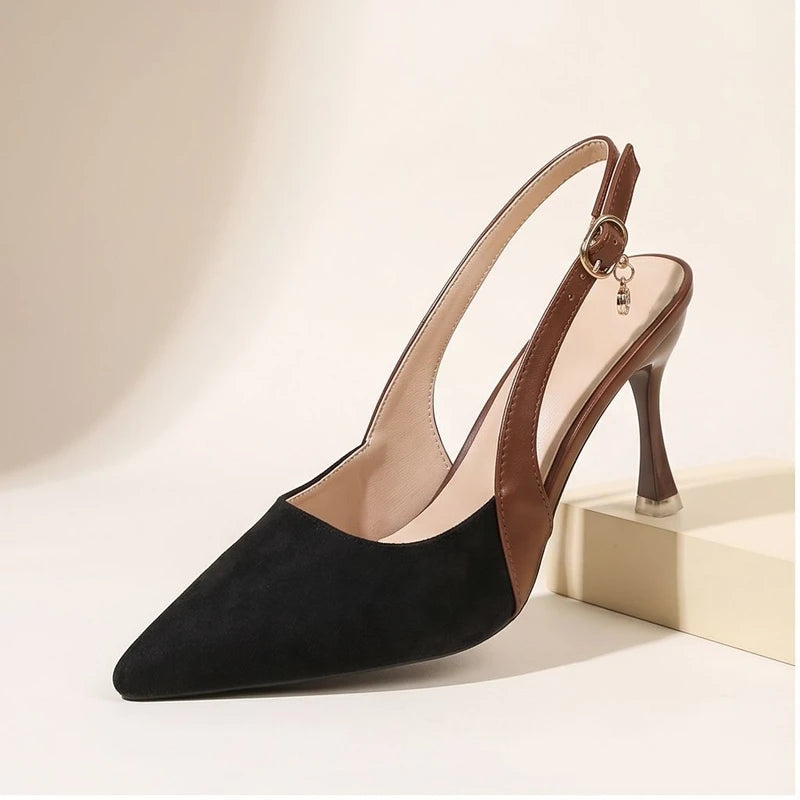Black linen flats in a studio background