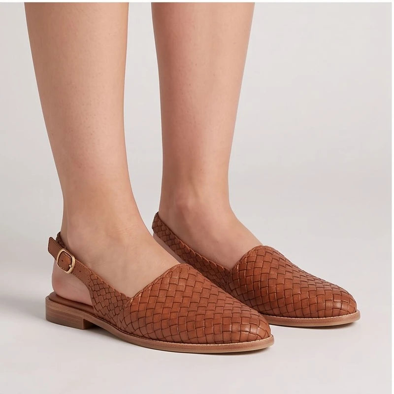 Model wearing Beige woven loafers in a studio - 2
