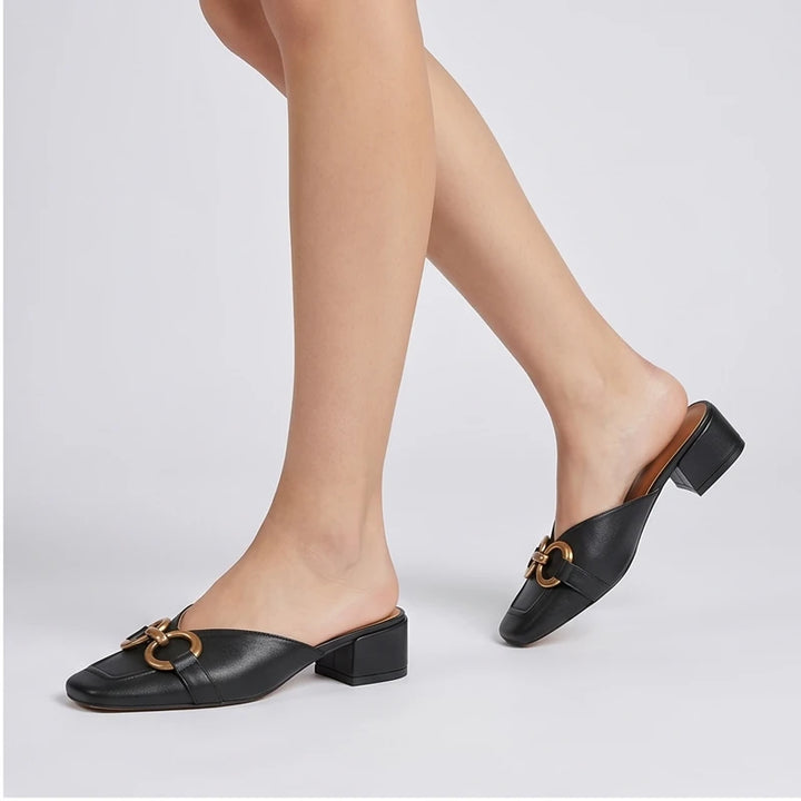 Model wearing Black Quincy Genuine Leather Square Toe Mules in studio - 2