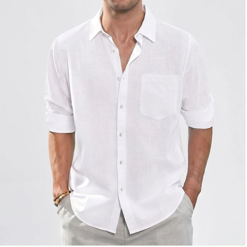 Men's white linen button-up shirt with chest pocket.
