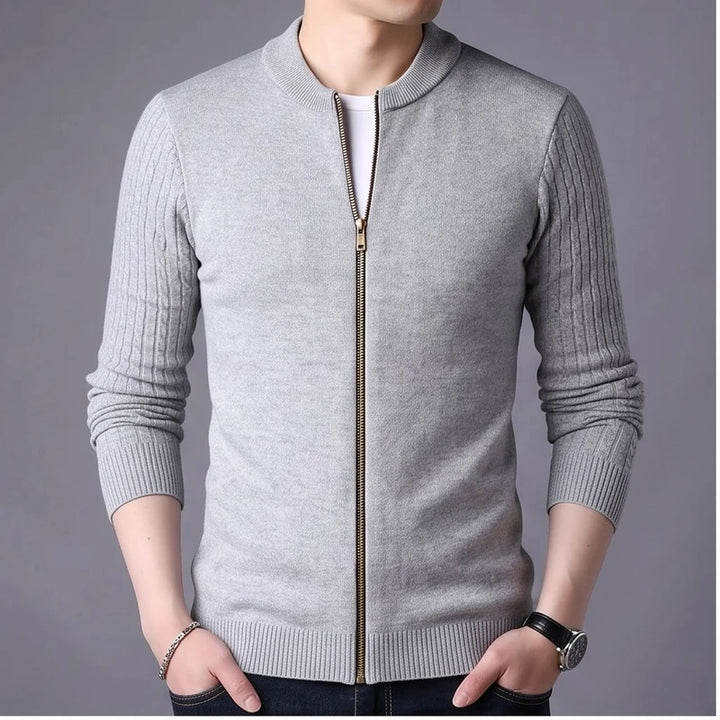 Model wearing Gray knit cardigan in a studio