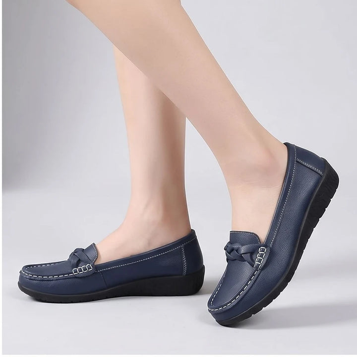 Model wearing NavyBlue leather flats in a studio - 2