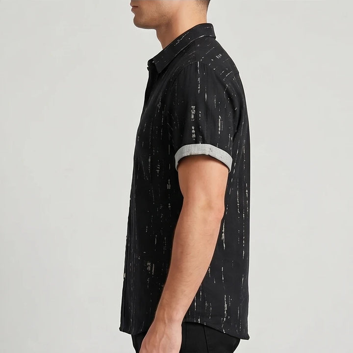 Model wearing Black Wilder Short Sleeve Button-Up Shirt in studio - 4