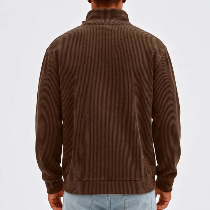 Model wearing Brown corduroy pullover in a studio - 2