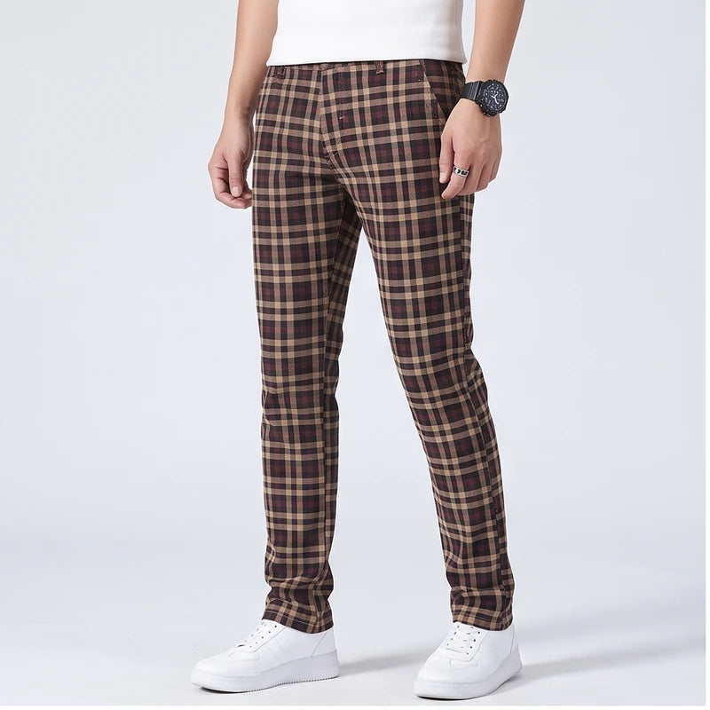 Model wearing Dark khaki cotton pants in a studio