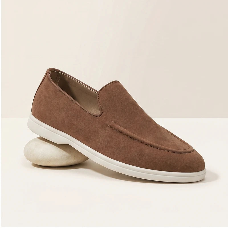 Brown suede loafers in a studio background - 2