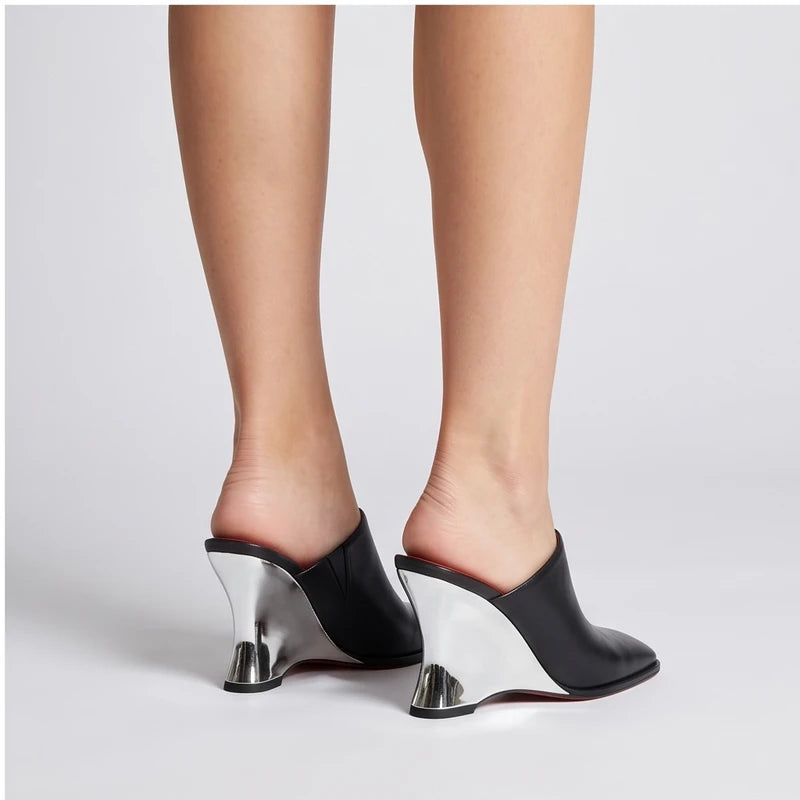 Model wearing Black Olympia Genuine Cowhide Leather Heeled Mules in studio - 4