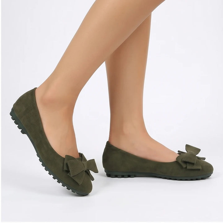 Model wearing Green Briony Suede Bow Flats in studio - 2