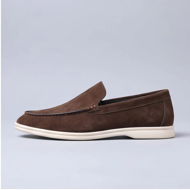 brown suede loafers in a studio background - 2