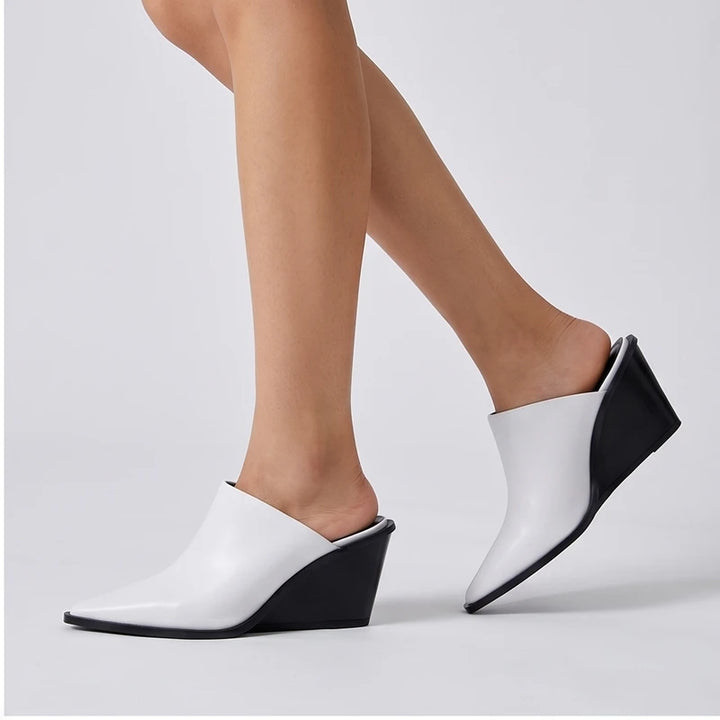 Model wearing White cowhide Valdis Genuine Leather Wedge Mules in studio - 2