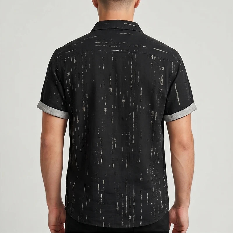 Model wearing Black Wilder Short Sleeve Button-Up Shirt in studio - 2