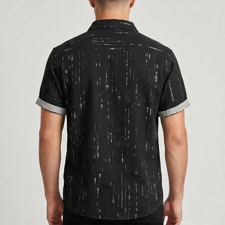 Model wearing Black Wilder Short Sleeve Button-Up Shirt in studio - 2
