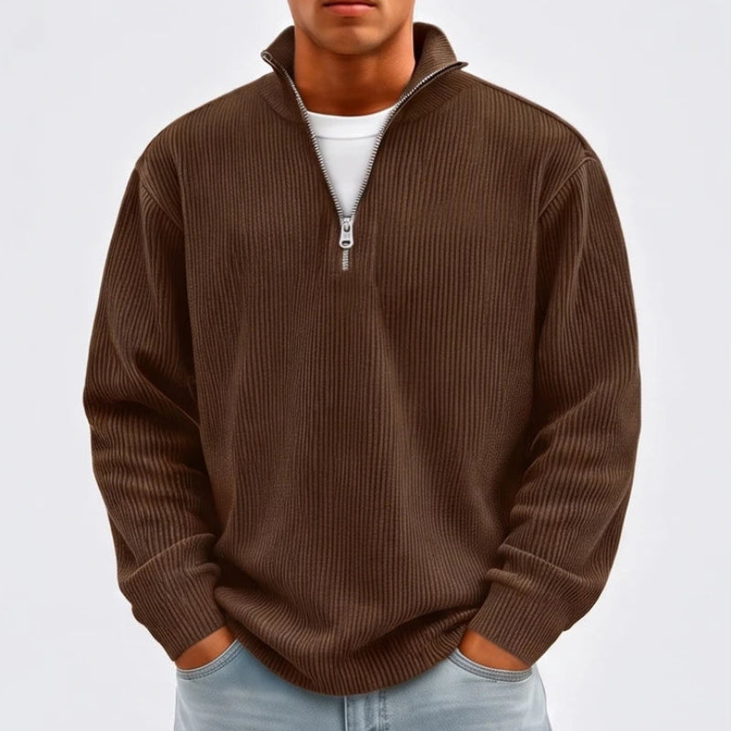 Model wearing Brown corduroy pullover in a studio