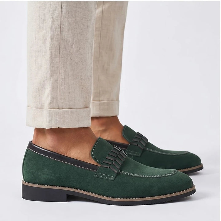 Model wearing Green Driscoll Suede Penny Loafers [needs new images[ in studio - 2