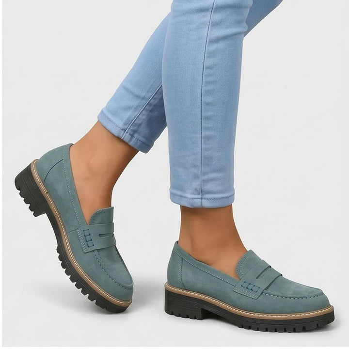 Model wearing Green Brynn Suede Penny Loafers  [needs new images] in studio - 2