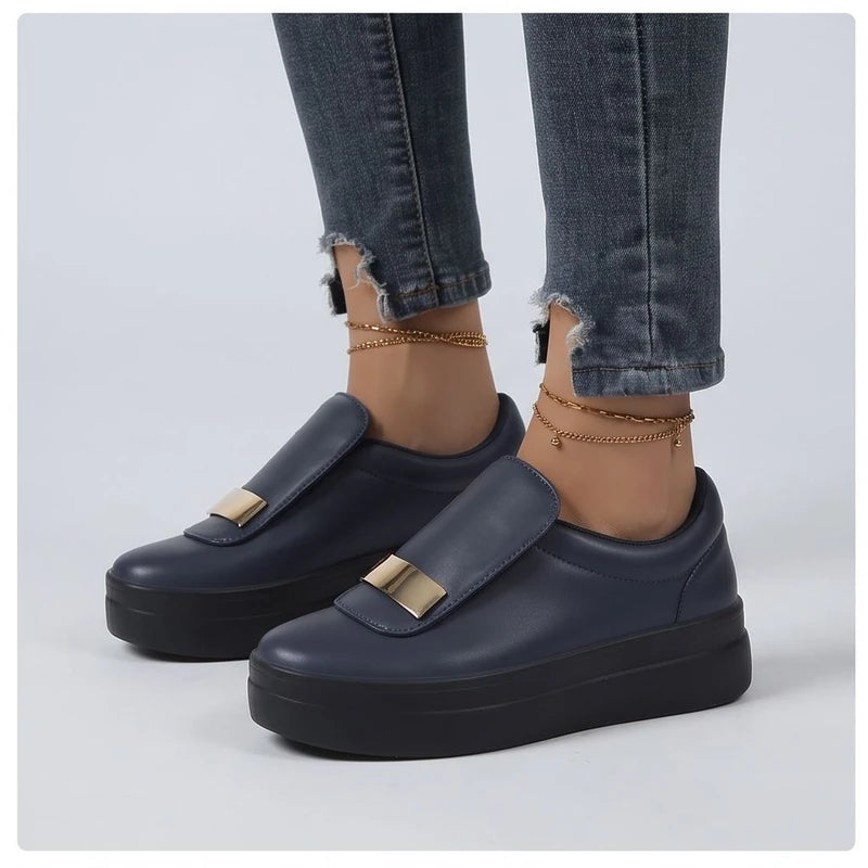 Model wearing Blue metal sneakers in a studio - 2