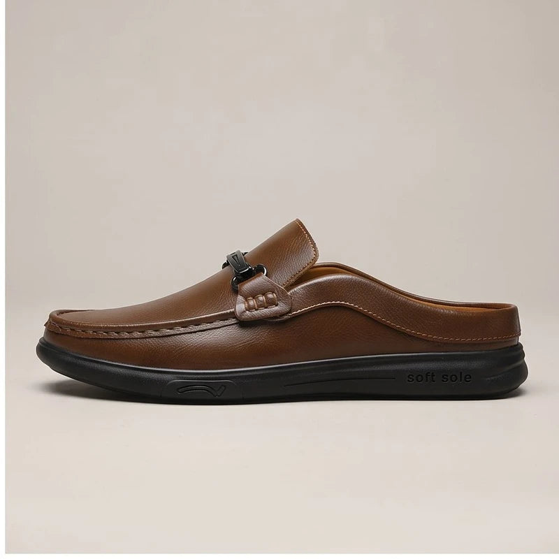 Brown leather mules in a studio background - 2