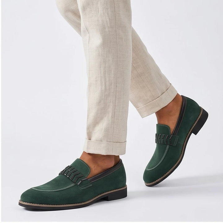 Model wearing Green Driscoll Suede Penny Loafers [needs new images[ in studio