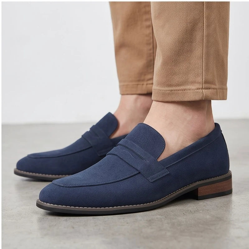 Model wearing Blue suede loafers in a studio - 3