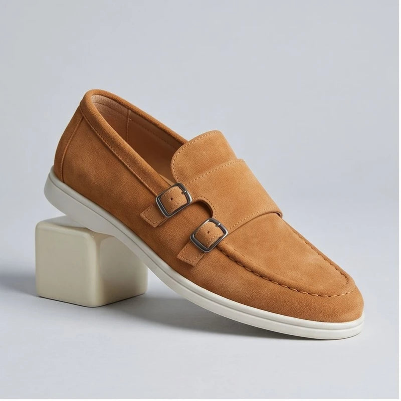 Tan suede double monk strap loafers with white soles.