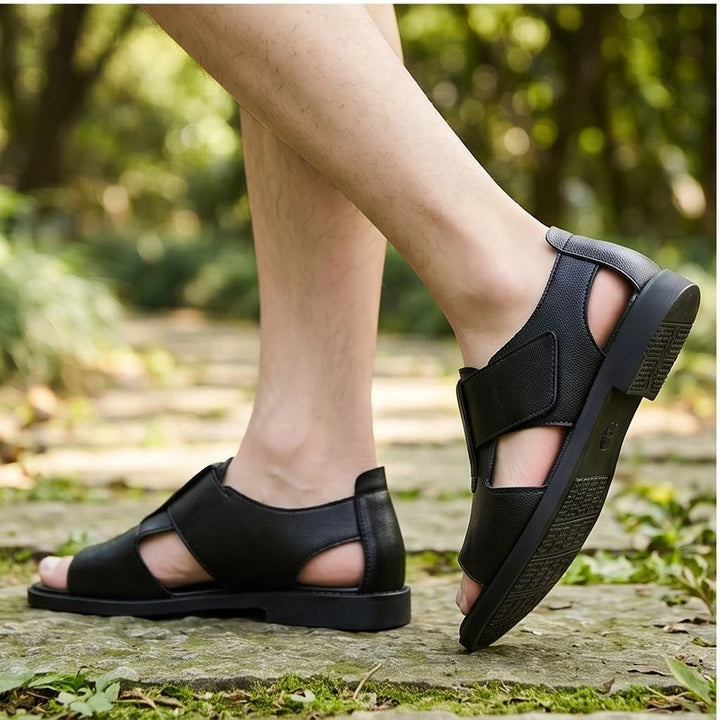 Model wearing black Kestrel Genuine Leather Gladiator Sandals outdoors - 3