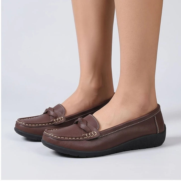Model wearing Brown leather flats in a studio - 2