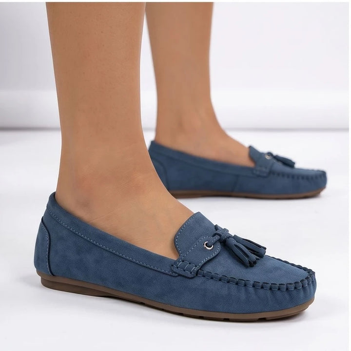 Model wearing Blue loafers in a studio - 3