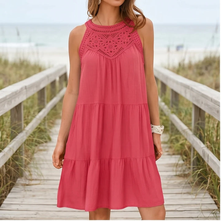 Model wearing Pink Azura Cotton Crochet Tiered Dress outdoors