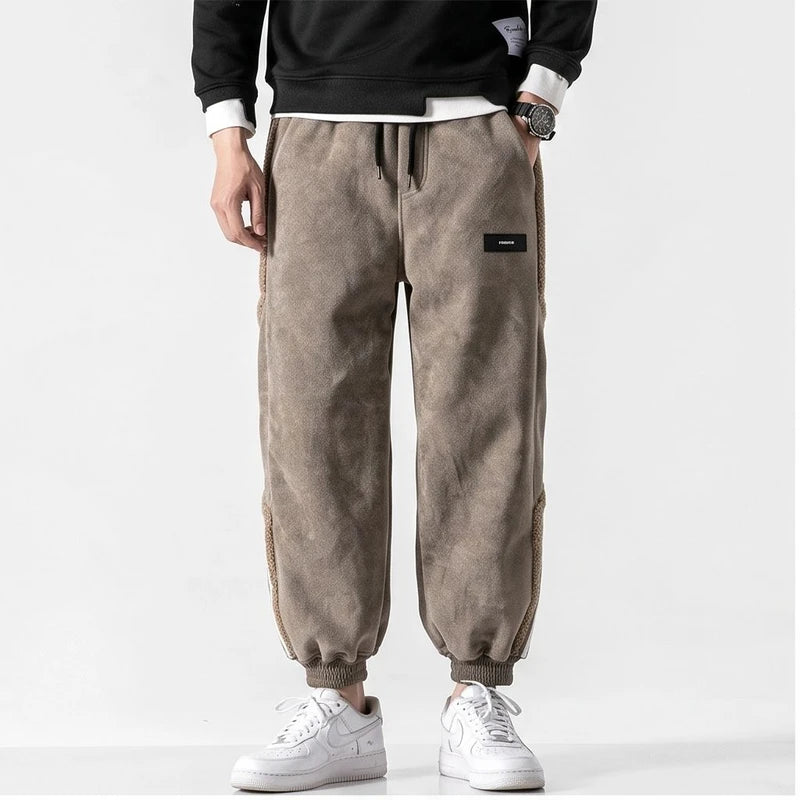 Model wearing Khaki apparel in a studio