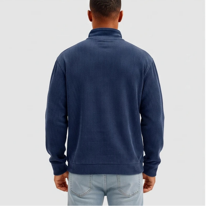Model wearing Navy corduroy pullover in a studio - 2