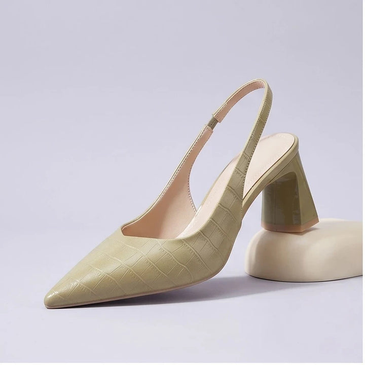 Yellow heel in a studio background