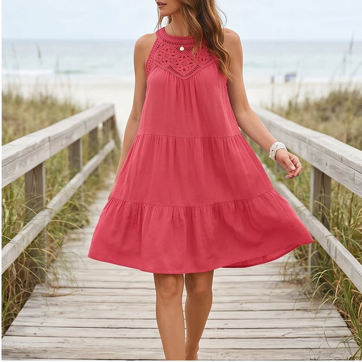Model wearing Pink Azura Cotton Crochet Tiered Dress outdoors - 2