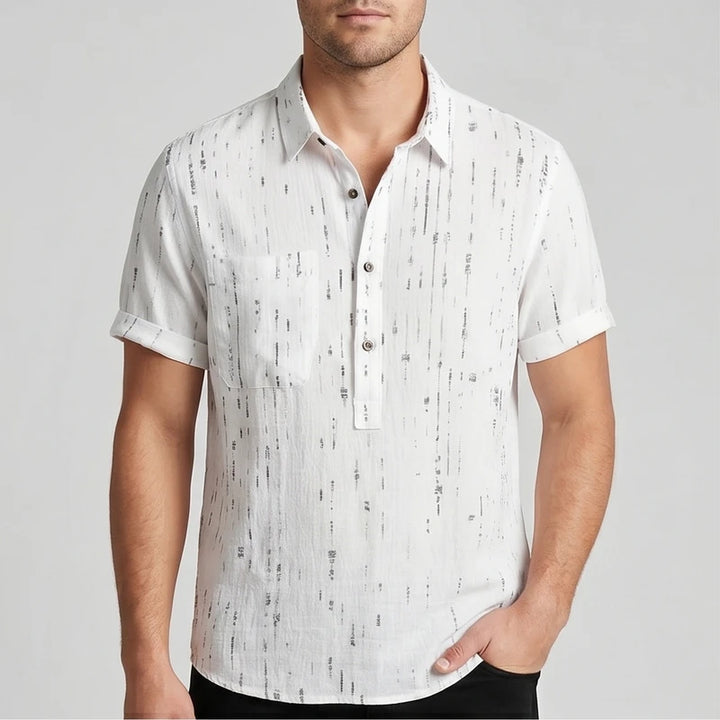 Model wearing White Wilder Short Sleeve Button-Up Shirt in studio