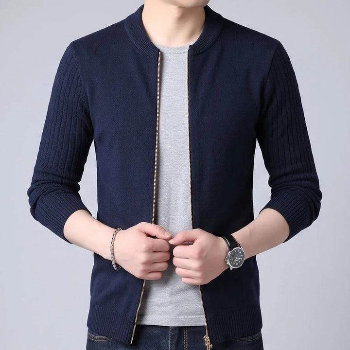 Model wearing Navy Blue knit cardigan in a studio